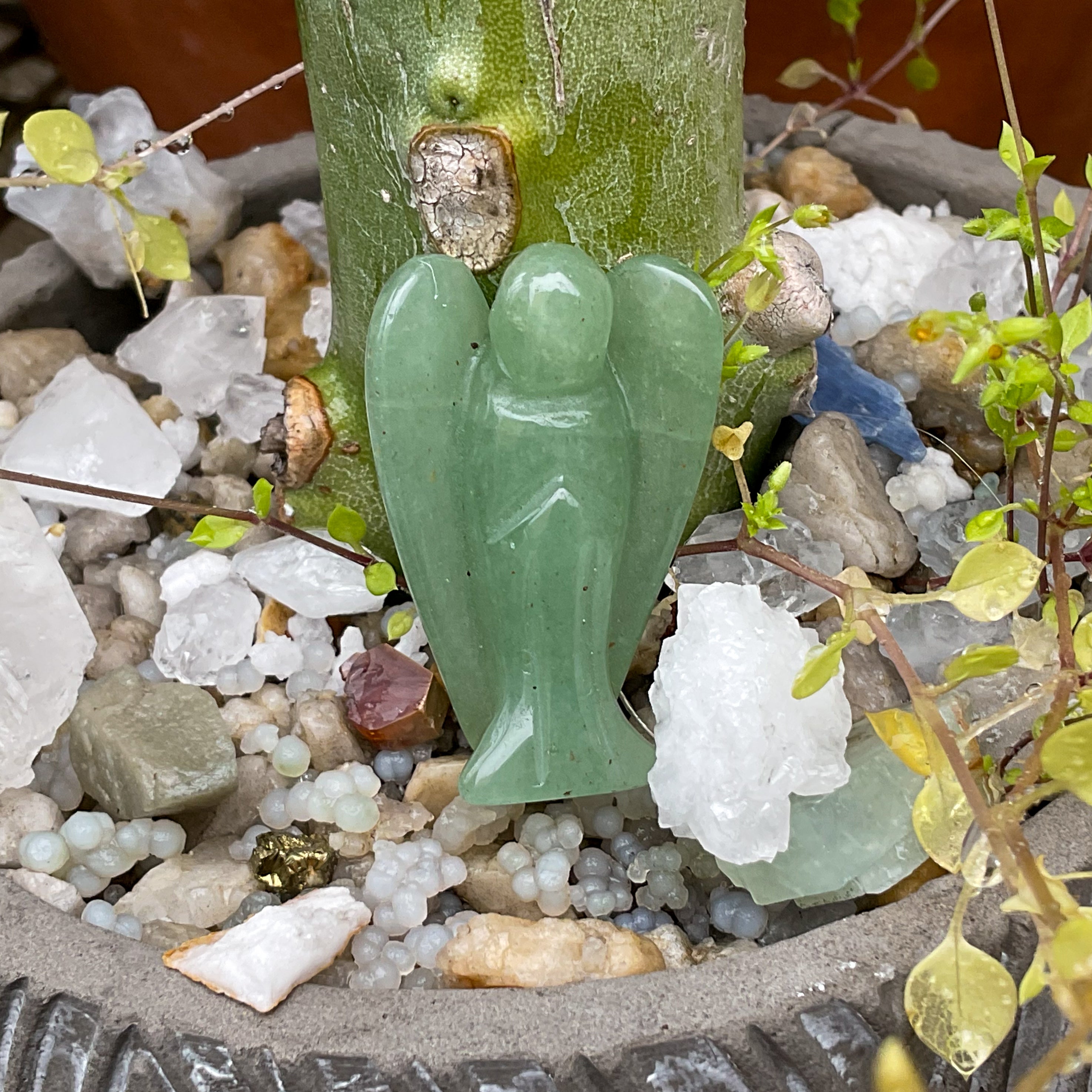 Stone crystal angel carving in green aventurine