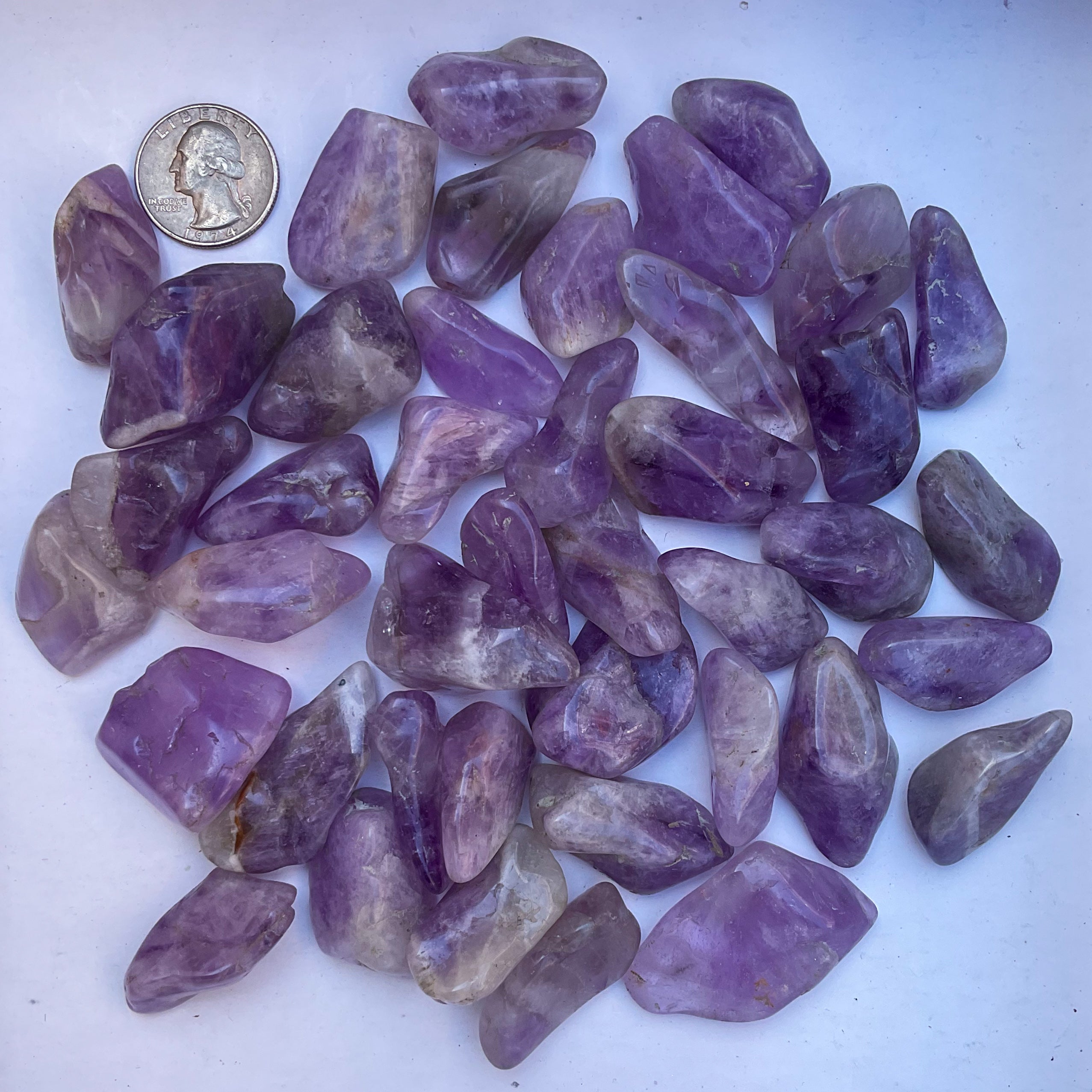 Wholesale tumbled stones bulk lot in amethyst