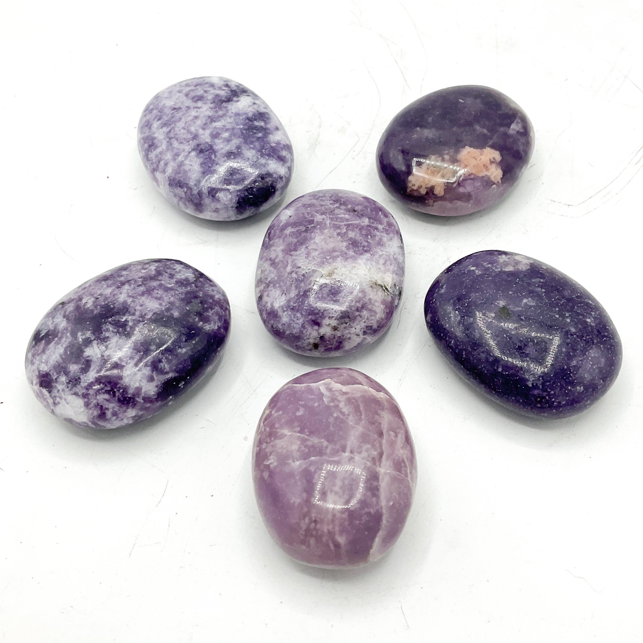 lepidolite crystal healing palm stones